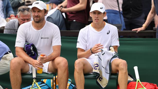 Matt Reid and De Minaur during their men's doubles first round match at Wimbledon. Picture: Getty Images