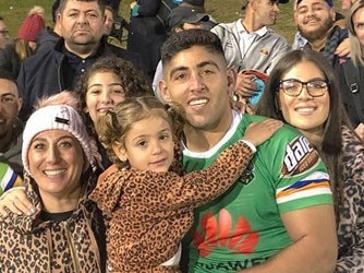 Emre Guler pictured with his family. Image: NRL