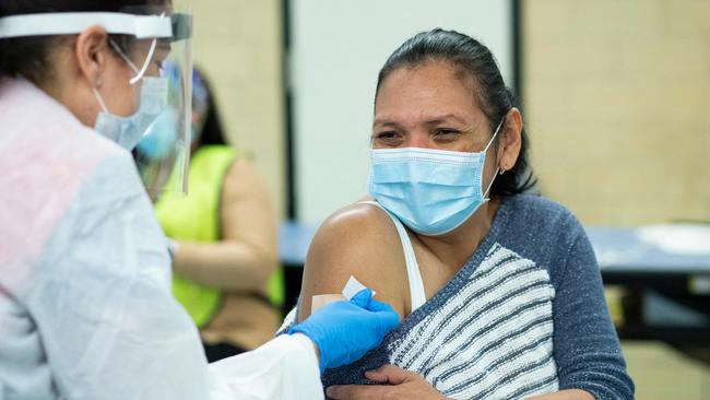 A woman receives a dose of the Moderna coronavirus vaccine at a vaccination site in New York. Picture: Kena Betancur / AFP