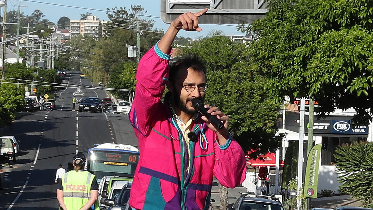 Greens councillor Jonathan Sri leads a blockade at the corner of Montague Road and Victoria Street, West End, highlighting the need for traffic lights at the intersection and more pedestrian safety in the area. Photographer: Liam Kidston.