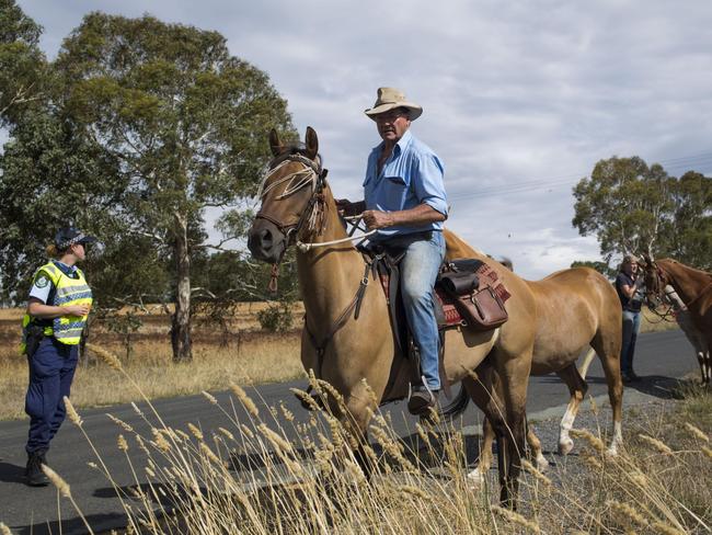 Ben Copeman evacuates his horses near Queanbeyan. Picture: Sean Davey
