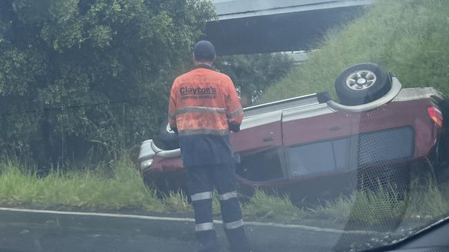 A car rollover at Pacific Paradise on Saturday afternoon marked a chaotic day on the Sunshine Coast, with multiple incidents keeping emergency crews busy. Photo: Sam Turner