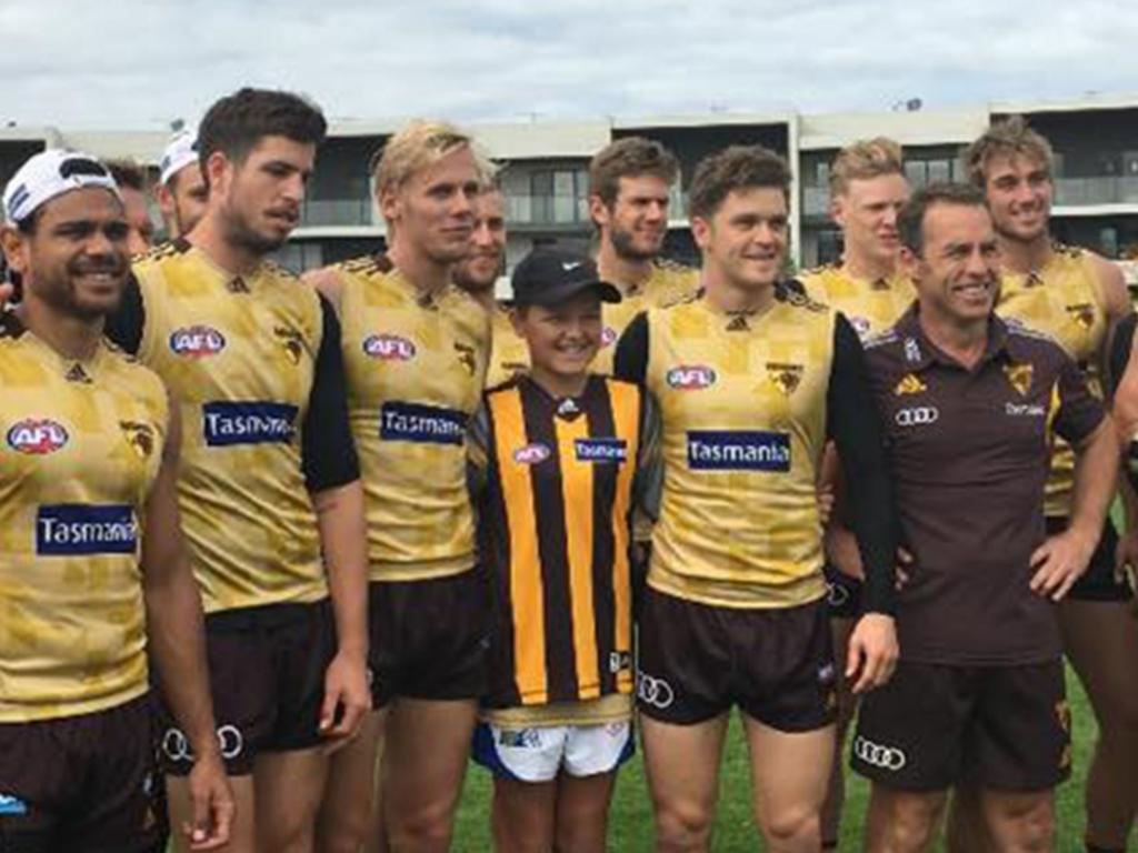 Jack Ginnivan with Hawthorn players as a kid. Picture: Facebook