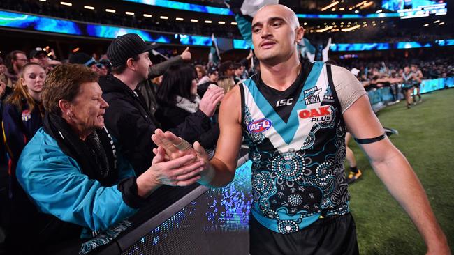 Sam Powell-Pepper celebrates with fans after Port Adelaide beat Richmond. Picture: David Mariuz.