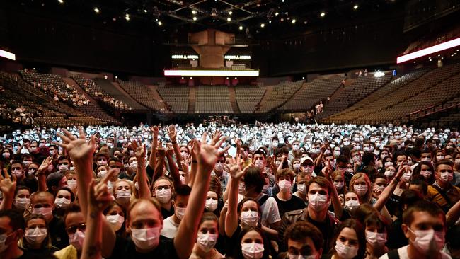 No social distancing was required but masks were compulsory at Saturday night’s gig by Indochine at Paris’s Bercy concert hall. Picture: AFP