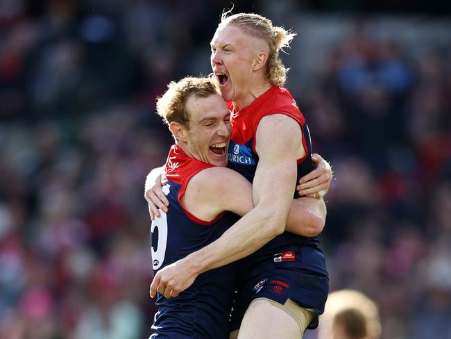 MELBOURNE . 02/04/2023.  AFL Round 3.  Melbourne vs Sydney Swans at the MCG.  Clayton Oliver of the Demons celebrates a 1st quarter goal with Harrison Petty  . Pic: Michael Klein