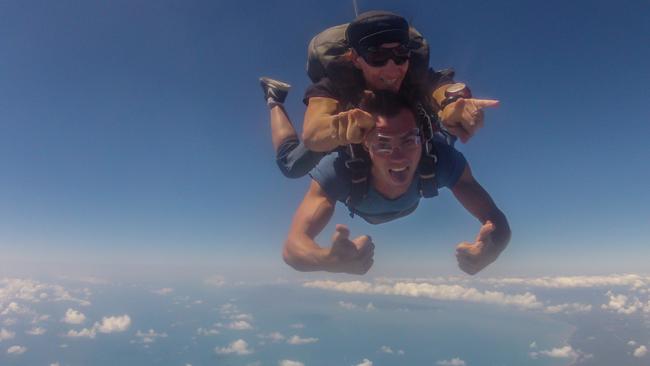 Man and male guide skydiving over Mission Beach, Cassowary Coast. Photo: TTNQ