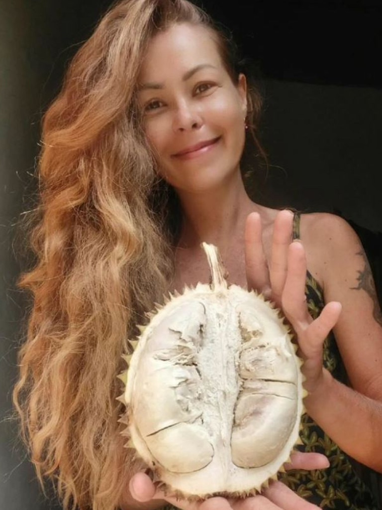 Samsonova with one of her favourite fruits, the durian. Picture: Instagram/rawveganfoodchef