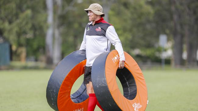 Coach Brad Thorn in action during a training session with the Reds in Brisbane.