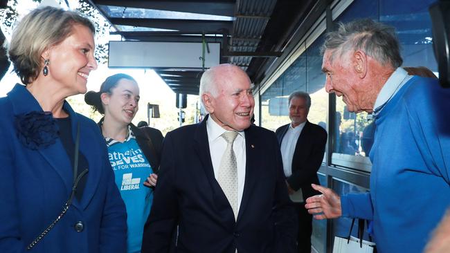 Liberal candidate for Warringah Katherine Deves and former PM John Howard walk the Manly Corso on Sydney’s northern beaches. Picture: John Feder