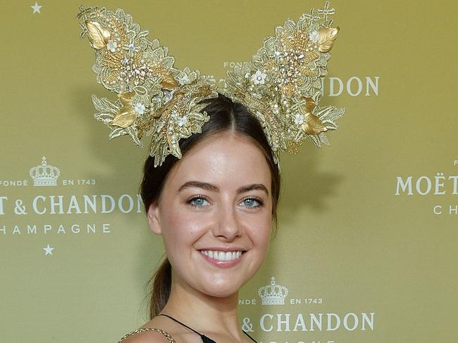 April Rose Pengilly shows off her stunning Viktoria Novak headpiece.