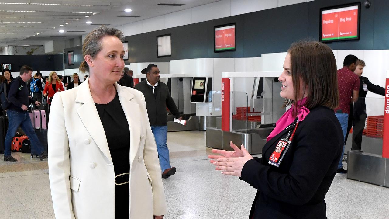 Qantas chief Vanessa Hudson chats with staff at Melbourne’s Tullamarine Airport on Wednesday. Picture: Getty Images