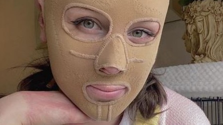 The 26-year-old wearing her compression mask to heal her burns scars. Picture: Instagram