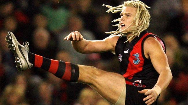 Courtney Johns kicks one of his 18 career goals for Essendon.