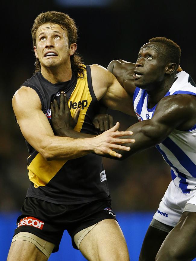 Maric in action against North Melbourne’s Majak Daw in 2015. Picture: Wayne Ludbey