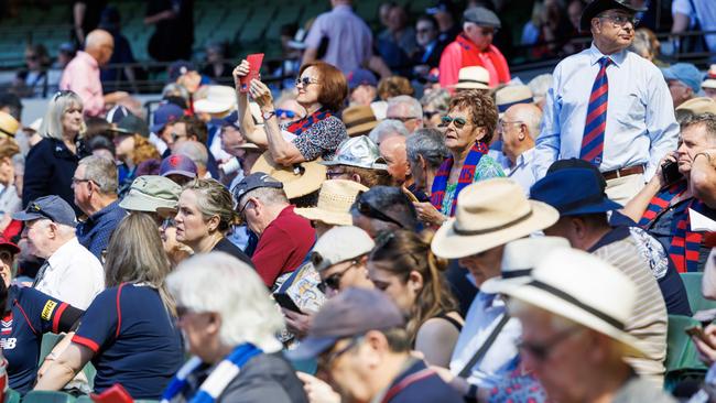 Huge crowds have gathered for the service to honour the life of Australian Football League legend Ronald Dale Barassi AM at the MCG. Picture: Aaron Francis