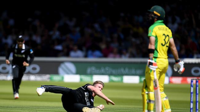 Jimmy Neesham takes a return catch after Glenn Maxwell mistimes a pull shot. Picture: Getty