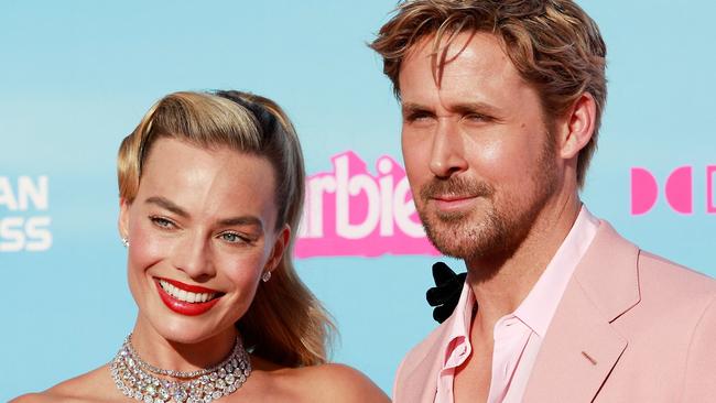 CORRECTION / Australian actress Margot Robbie and Canadian actor Ryan Gosling arrive for the world premiere of "Barbie" at the Shrine Auditorium in Los Angeles, on July 9, 2023. (Photo by Michael Tran / AFP) / âThe erroneous mention[s] appearing in the metadata of this photo by Michael Tran has been modified in AFP systems in the following manner: [Canadian actor Ryan Gosling] instead of [Canadian-US actor Ryan Reynolds]. Please immediately remove the erroneous mention[s] from all your online services and delete it (them) from your servers. If you have been authorized by AFP to distribute it (them) to third parties, please ensure that the same actions are carried out by them. Failure to promptly comply with these instructions will entail liability on your part for any continued or post notification usage. Therefore we thank you very much for all your attention and prompt action. We are sorry for the inconvenience this notification may cause and remain at your disposal for any further information you may require.â