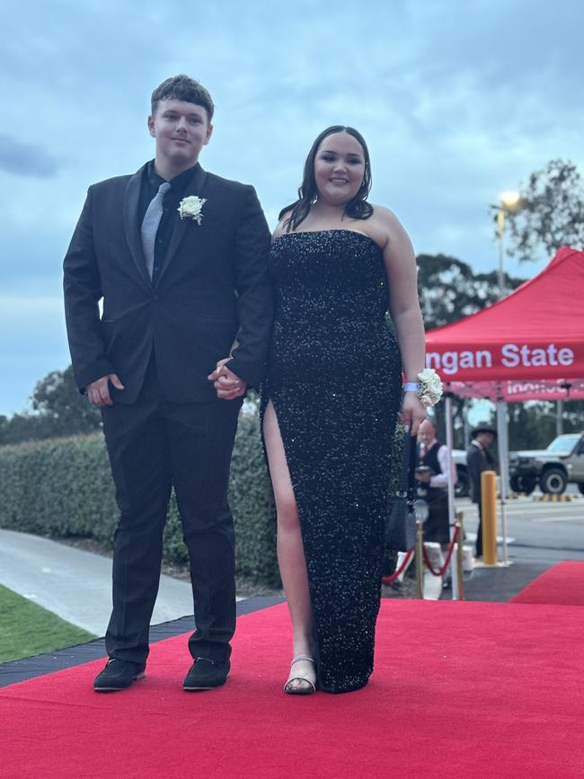 The students of Urangan State High School arriving at their formal.