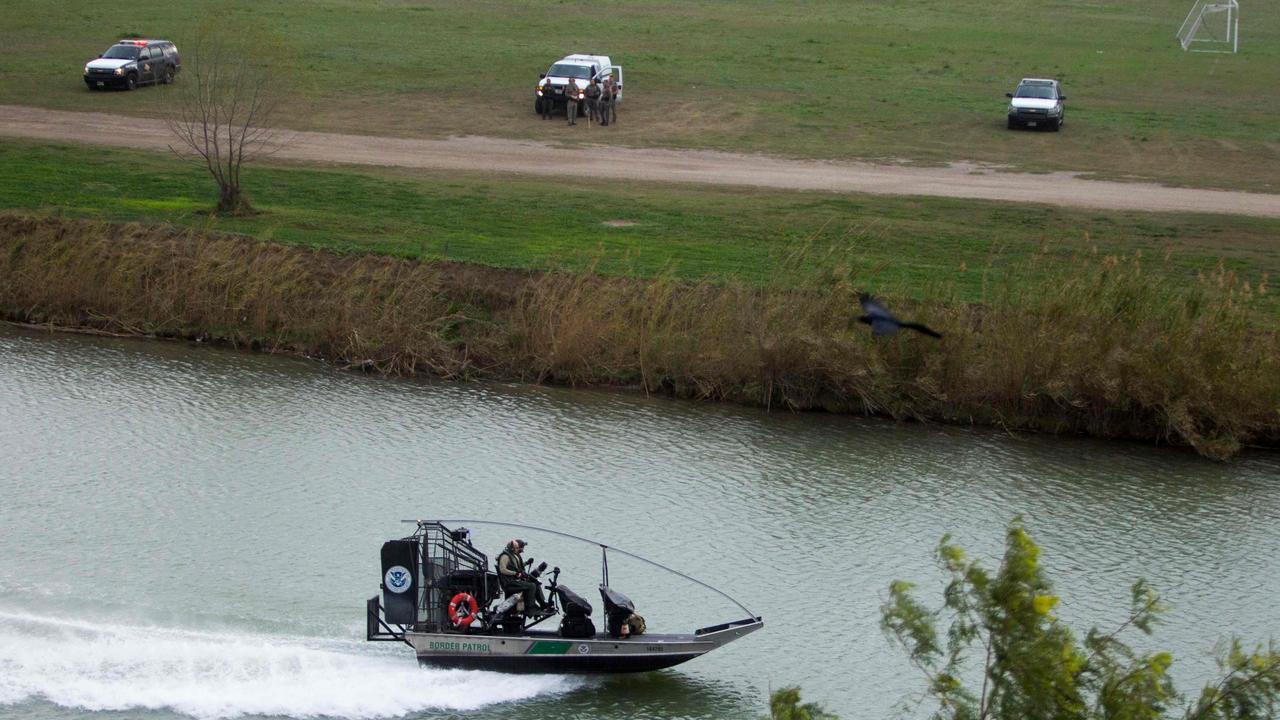 Members of the US Border Police guard the Rio Bravo. Picture: Julio Cesar Aguilar/AFP