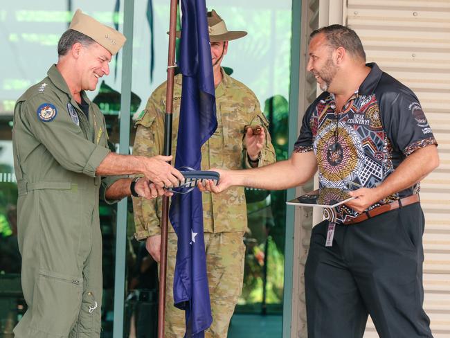 James Parfitt - Fejo welcomes Commander of US military forces in the Indo-Pacific, Admiral John C. Aquilino to Larrakia country with a pair of Thongs at Darwin’s Robertson Barracks. Picture: Glenn Campbell