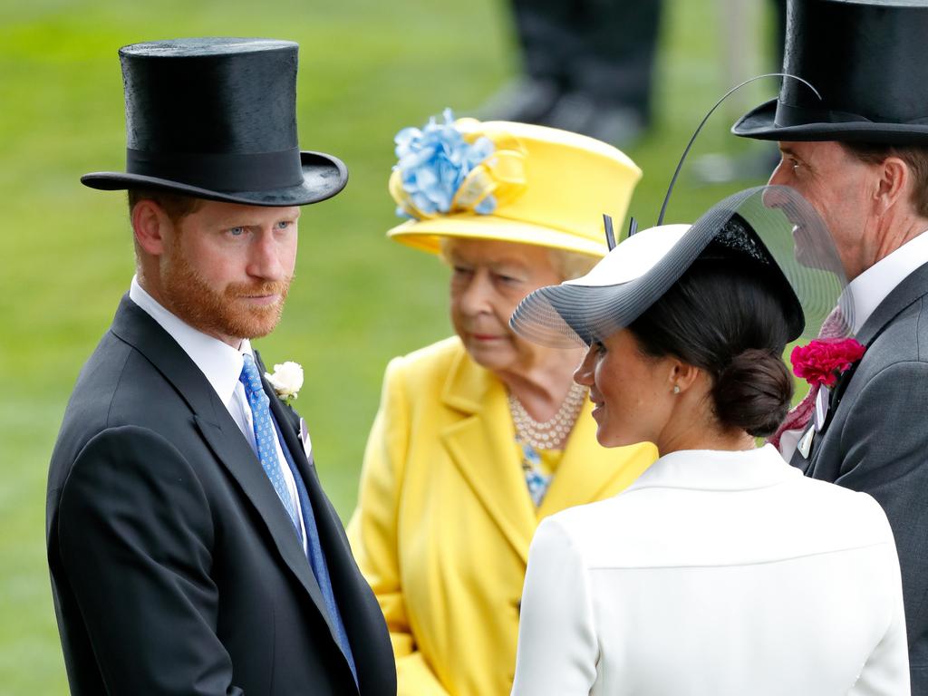 Prince Harry, Meghan, Duchess of Sussex and Queen Elizabeth II at Royal Ascot. Prince Harry recently said he would “protect” the Queen. Picture: Max Mumby/Indigo/Getty Images