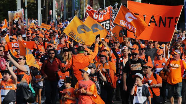 Giants fans march to the preliminary final last season. Picture: Toby Zerna