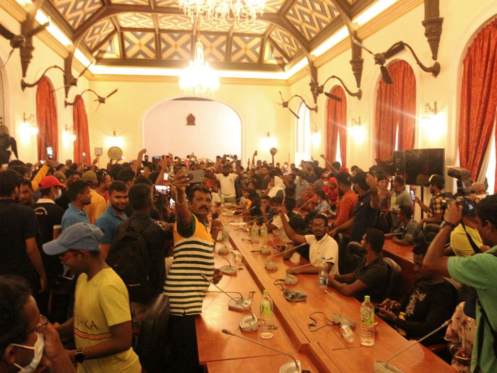 People crowd inside the official residence of Sri Lanka's President on July 10. Picture: AFP