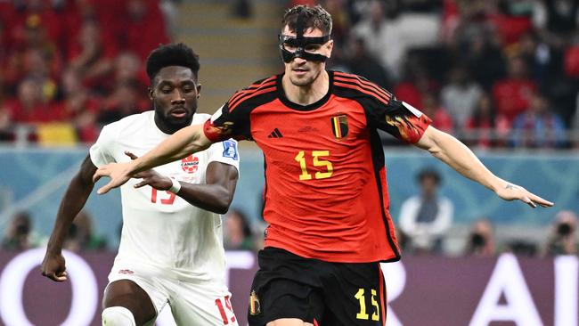 Belgium defender Thomas Meunier leads Canada’s Alphonso Davies to the ball. Picture: Jewel SAMAD / AFP