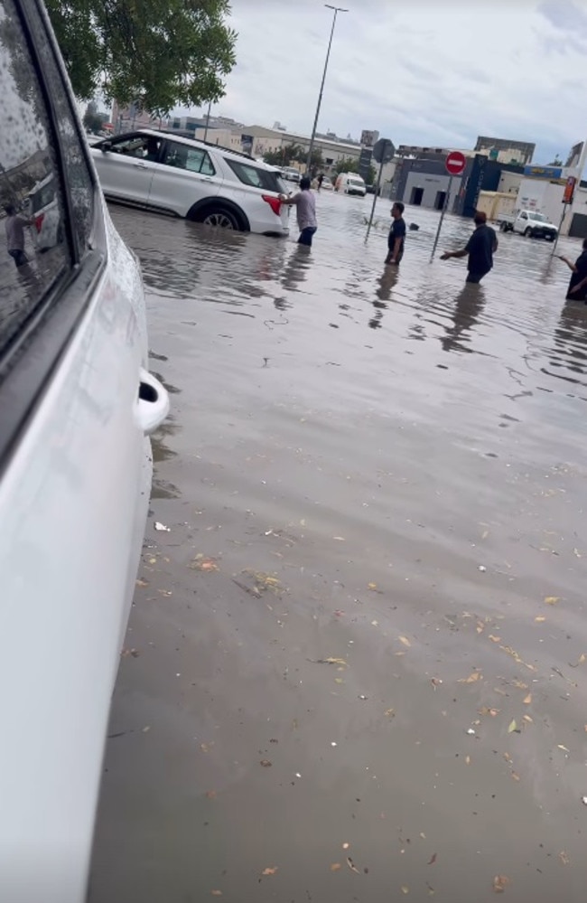 He also shared a group of strangers helping one another through flooded waters. Picture: Instagram/krisfade