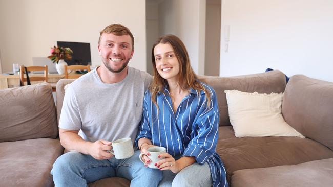 Engaged couple Alanna De Bris and Dylan Hanney putting are getting a mortgage instead of getting married. Picture: Rohan Kelly