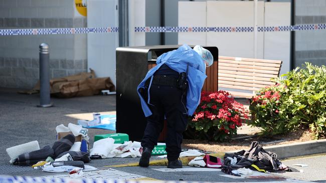 Police at the scene of an alleged stabbing of a security guard at Westfield Helensvale. Picture: Nigel Hallett