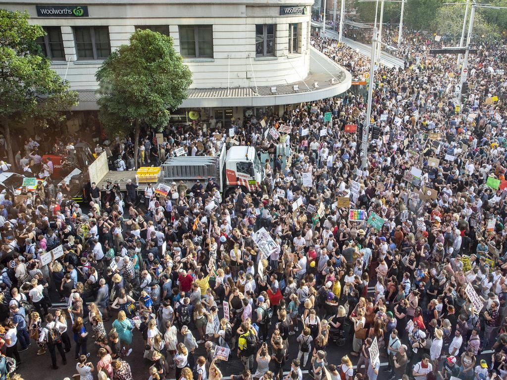 SYDNEY, AUSTRALIA - JANUARY 10: Activists rally for climate action at Sydney Town Hall on January 10, 2020 in Sydney, Australia. Protests around the country were organised in response to the ongoing bushfire crisis in Australia. Fires in New South Wales, Victoria, Queensland, Western Australia and South Australia have burned 8.4 million hectares of land. At least 25 people have been killed, including three volunteer firefighters, and thousands of homes and buildings have been destroyed. (Photo by Jenny Evans/Getty Images)