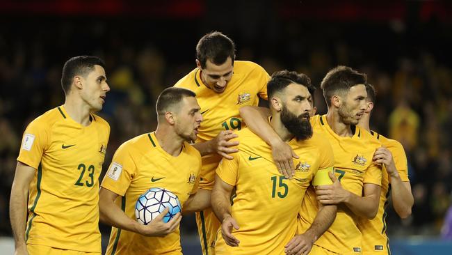 Socceroos skipper Mile Jedinak celebrates his goal.