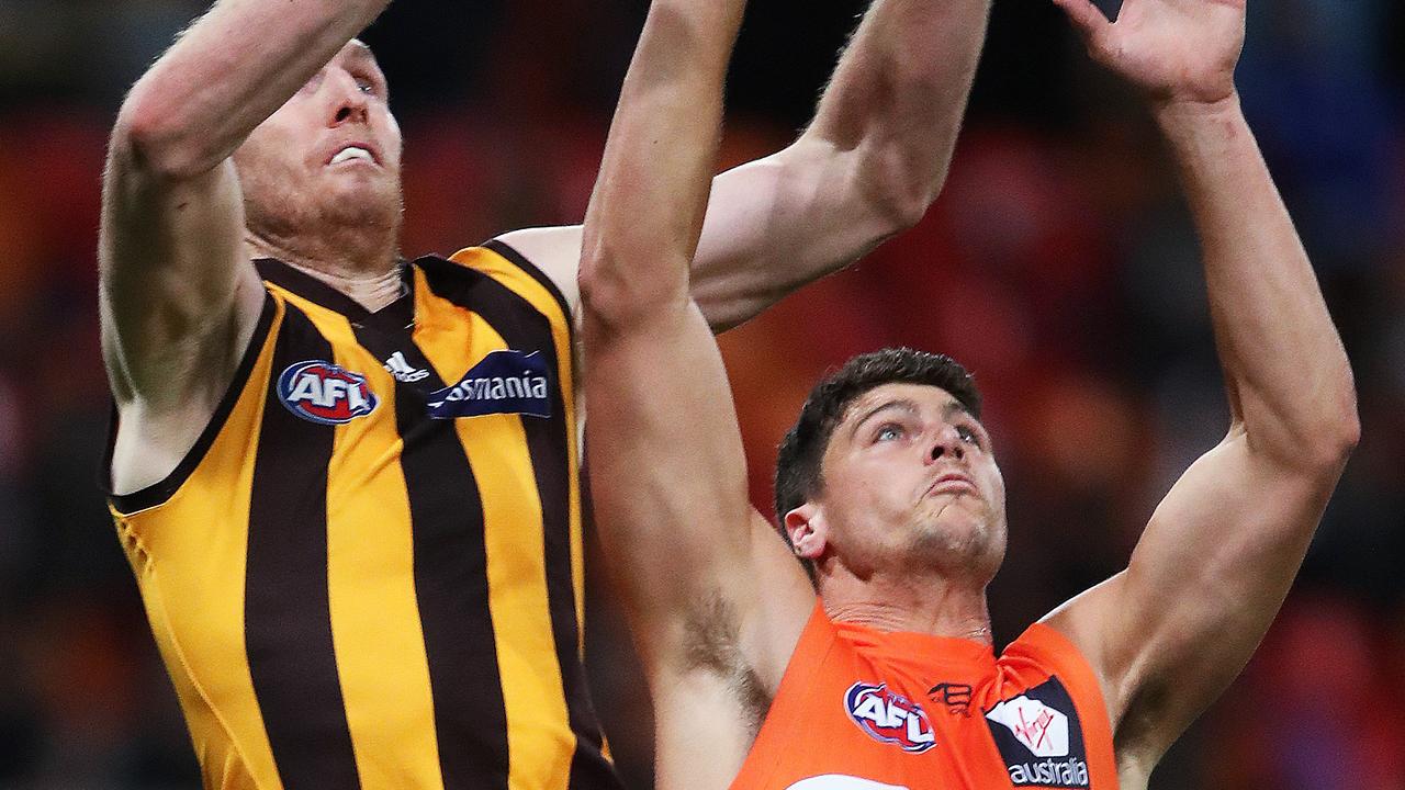 Jon Patton flies for a mark against his new club Hawthorn. Picture: Phil Hillyard.