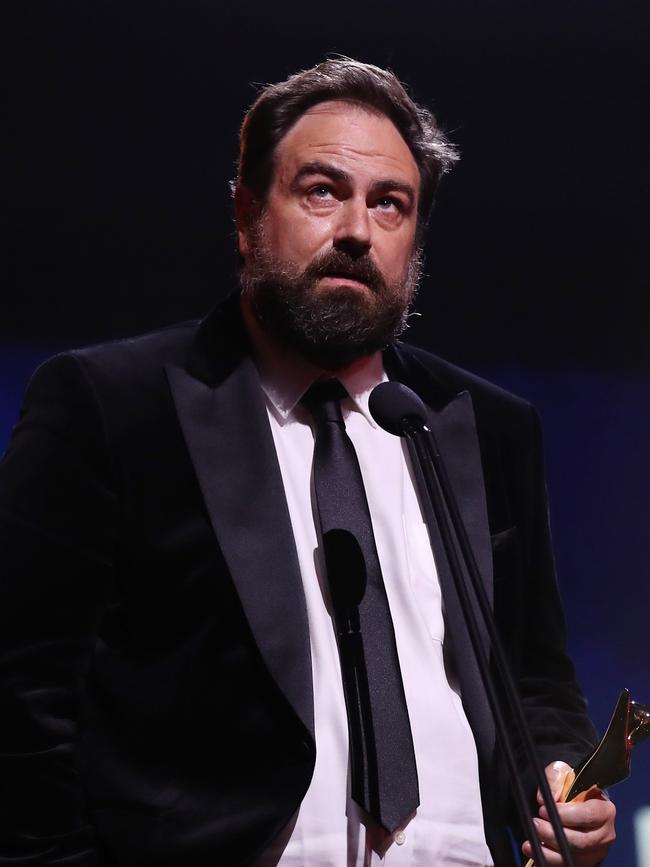 Justin Kurzel accepts the best director award for Nitram. Picture: Getty Images