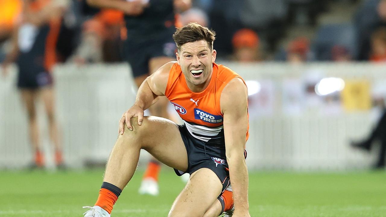 Toby Greene of the Giants grimaces after a tackle during the round eight AFL match between the Greater Western Sydney Giants and the Geelong Cats at Manuka Oval.