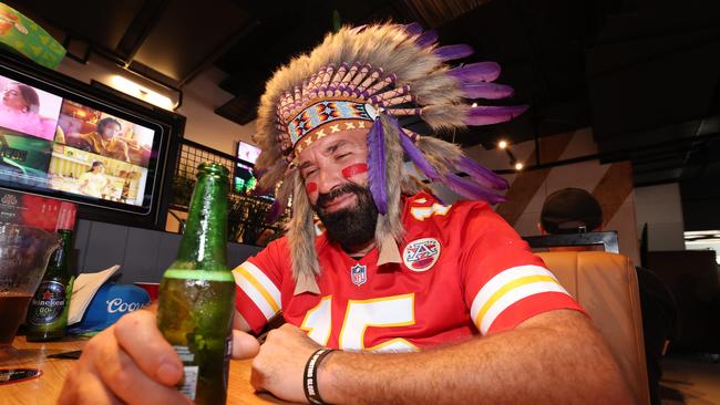 Super Bowl fever took over the Gold Coast Monday with a sellout crowd celebrating the NFL showdown at The Sporting Globe at Surfers Paradise. Kansas City Chiefs fan Mick "Big Chief" Green from Palm Beach can’t bear to watch his team cop a hiding. Picture Glenn Hampson