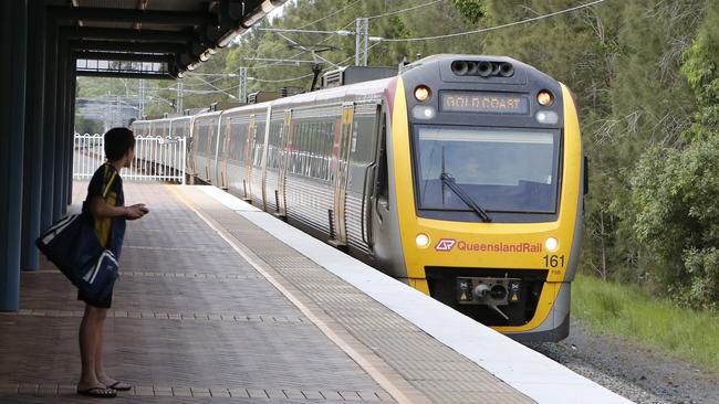 Commuters at the Helensvale Train station. Picture: JERAD WILLIAMS