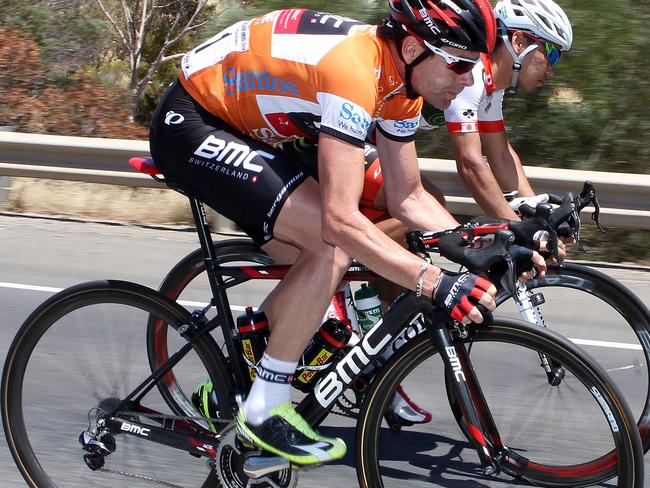 Tour Down Under - Stage 5 - McLaren Vale to Willunga Hill. Cadel Evans chases to get back on after a bike change. pic SARAH REED.