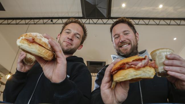 Landscapers Jake and Jesse Martin love a good feed while on the job. Picture: Valeriu Campan