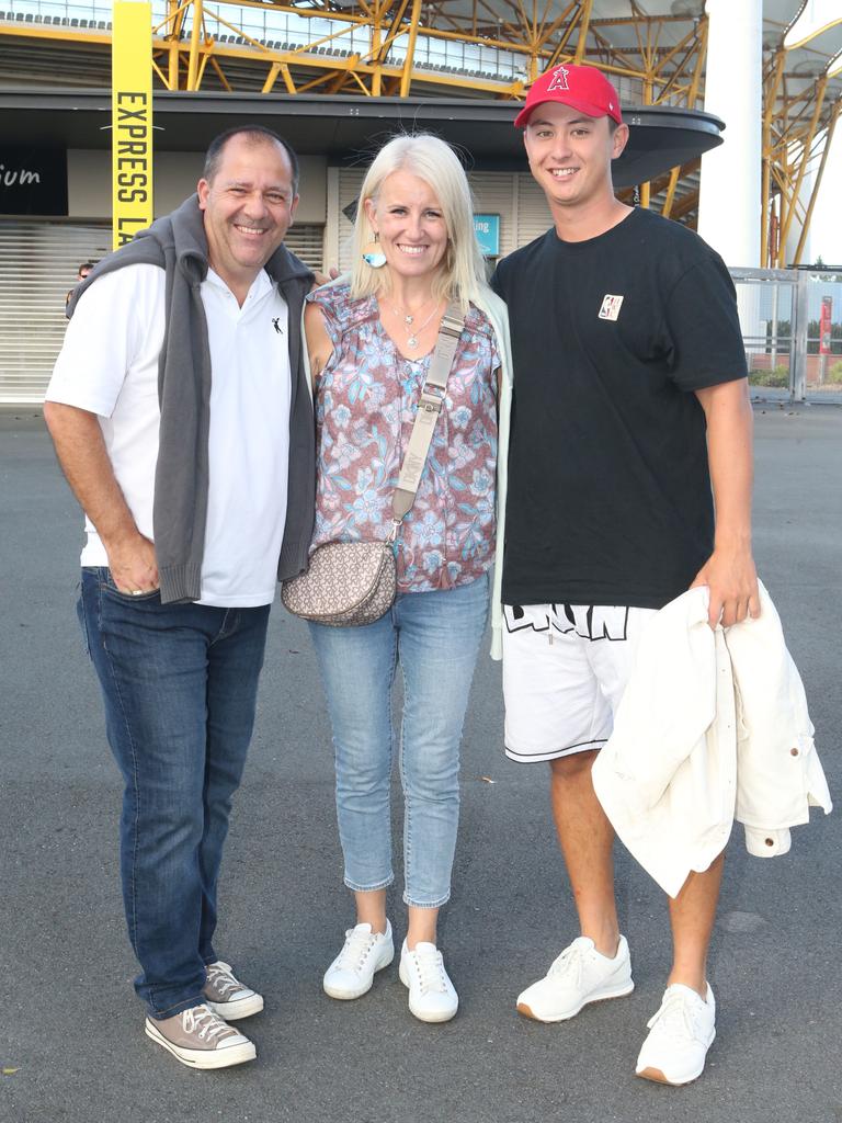 The Gold Coast Suns will host its first AFLW final when they take on the Sydney Swans on Saturday night. Chris and Liz King with Mai Phillips. 11 November 2023 Carrara Picture by Richard Gosling