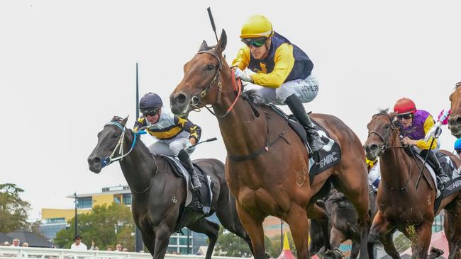 Roll On High (black cap) finished strongly behind Samangu at Caulfield. Picture: Jay Town/Racing Photos via Getty Images