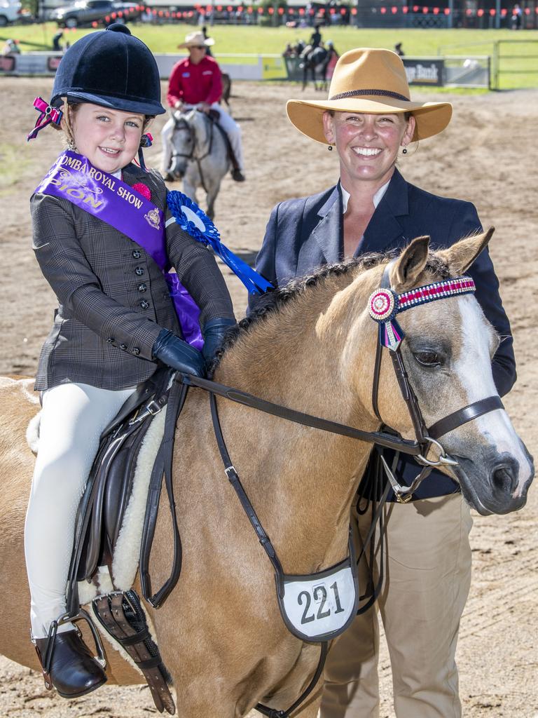 5 year old Audrey Siebenhausen won Champion Leading Rein Rider at her first Toowoomba Royal Show, pictured with her mother Amy Siebenhausen and her horse also named Audrey. Friday, March 25, 2022. Picture: Nev Madsen.