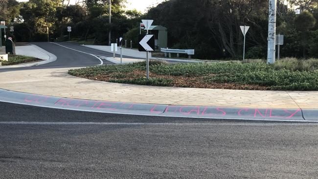 Graffiti telling out-of-towners to “go home”, on the roundabout at the corner of Old Melbourne and Canterbury-Jetty roads, Rye.