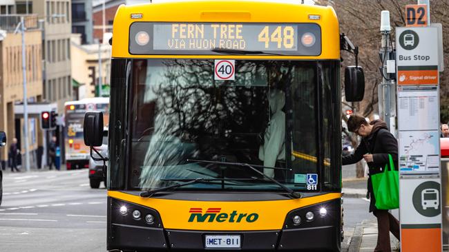 A passenger boards a bus at Franklin Square in Hobart. Picture: Linda Higginson