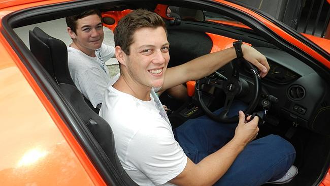 Jarrod Lawrence, 19, and younger brother Dylan, 14, will now be able to travel around Sydney easier after Castle Hill-based Body Tech Automotive donated a Toyota Sera to them. Picture: WARREN THOMSON. 