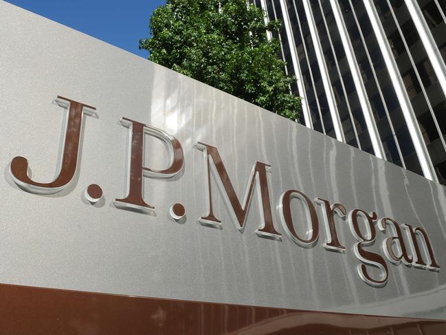 (FILES) This August 8, 2013 file photo shows a JPMorgan sign outside the office tower housing the financial services firm's Los Angeles, California offices. JPMorgan Chase's computer network has been hit by hackers for the second time in three months, the New York Times reported October 2, 2014. JPMorgan, the nation's largest bank by assets, found that hackers from Italy or another part of southern Europe accessed bank servers, the Times said, citing people familiar with the investigation. JPMorgan said in August that it was cooperating with law-enforcement officials to determine the scope of the first hacking episode. AFP PHOTO / Robyn Beck