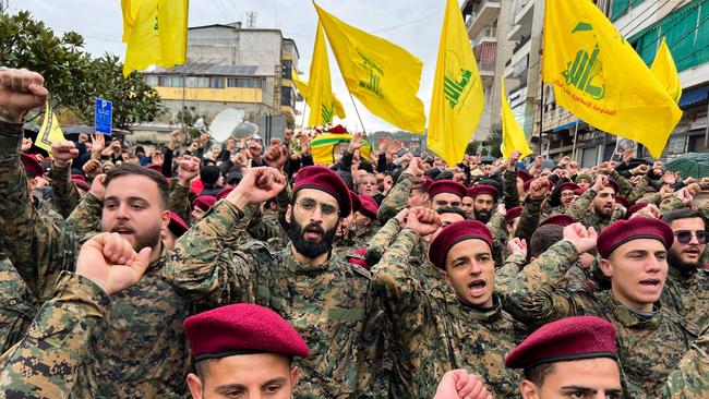 Hezbollah militants and supporters attend the funeral of Ali al-Debs, one of the militant group's commanders killed by an Israeli air raid in February, 2024. Picture: Mahmoud Zayatt/AFP