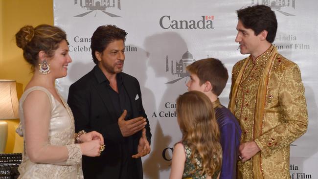 Justin Trudeau and Sophie Grégoire Trudeau and their children speak with Bollywood actor Shahrukh Khan in Mumbai. Picture: AFP